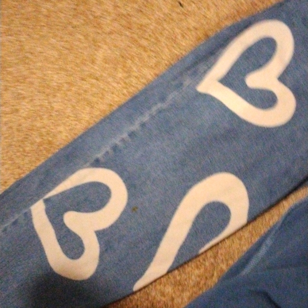 Blue jeans with white hearts